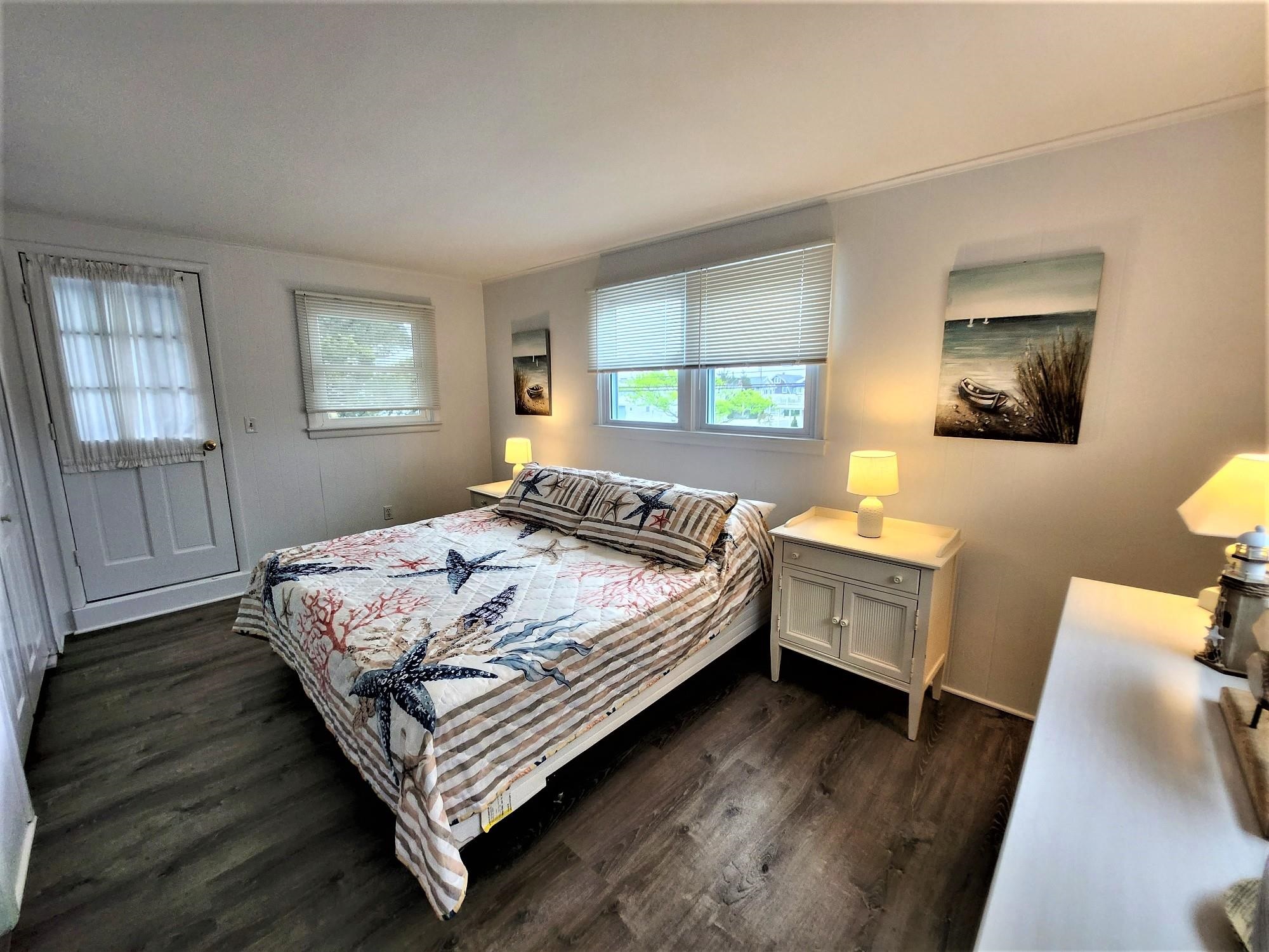 9903 2nd Stone Harbor, NJ 08247 - Photo 15 of 28 a bedroom with a bed and a window