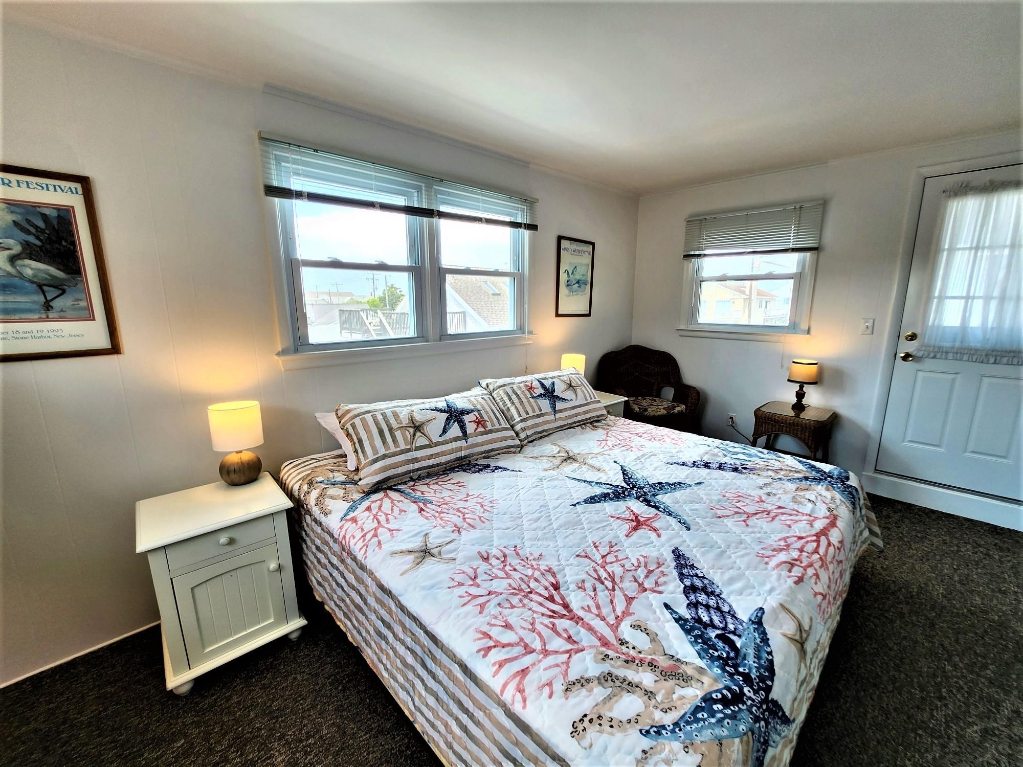 9903 2nd Stone Harbor, NJ 08247 - Photo 22 of 28 a bedroom with bed and a window