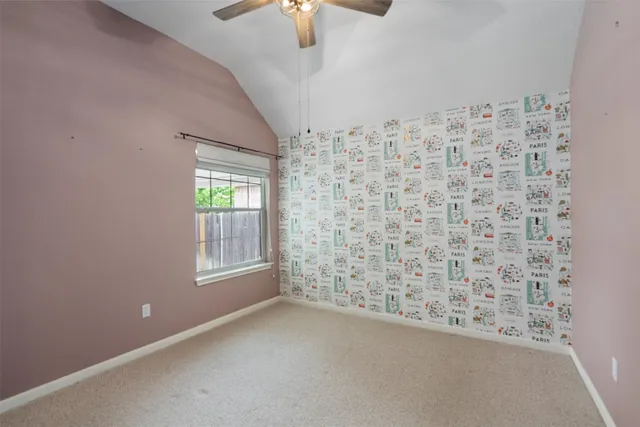 a view of empty room with windows