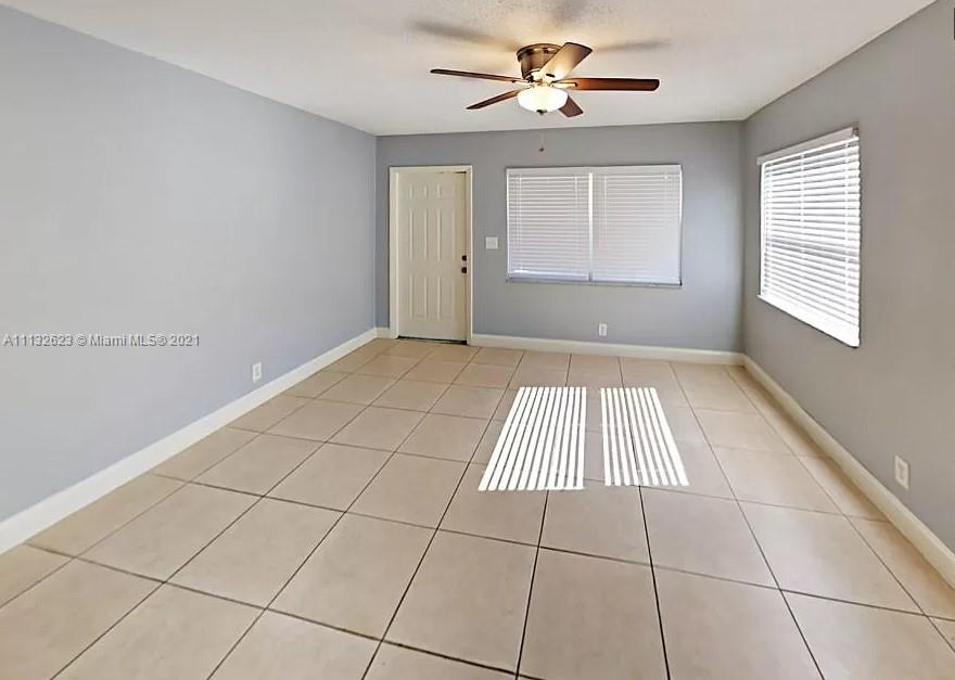 Avondale Pompano Beach, FL 33060 - Photo 4 of 18 a view of an empty room and window