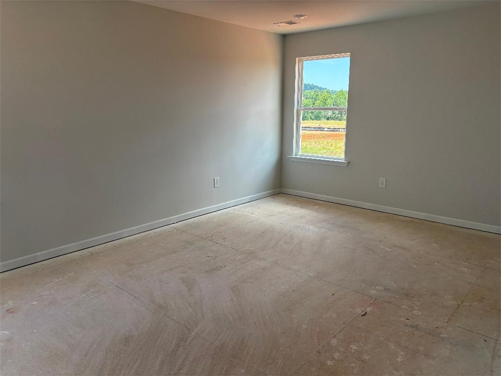 129 Cedar Shoals Easley, SC 29640 - Photo 13 of 31 A well-lit room awaits personalization, offering a canvas for your ideal living space.