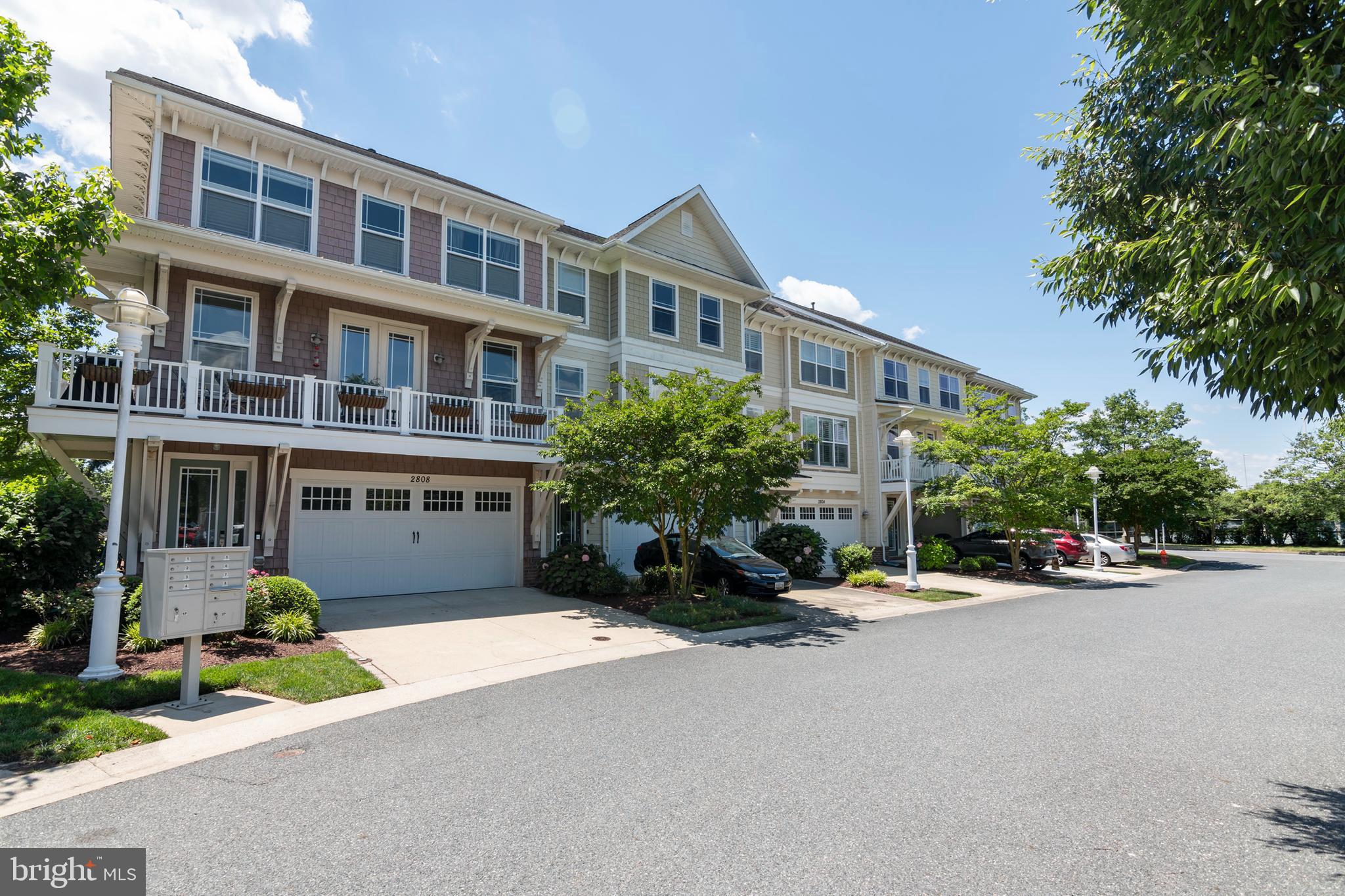 2804 Persimmon Place, Unit D3 Cambridge, MD 21613 - Photo 23 of 49 a front view of a building with a street
