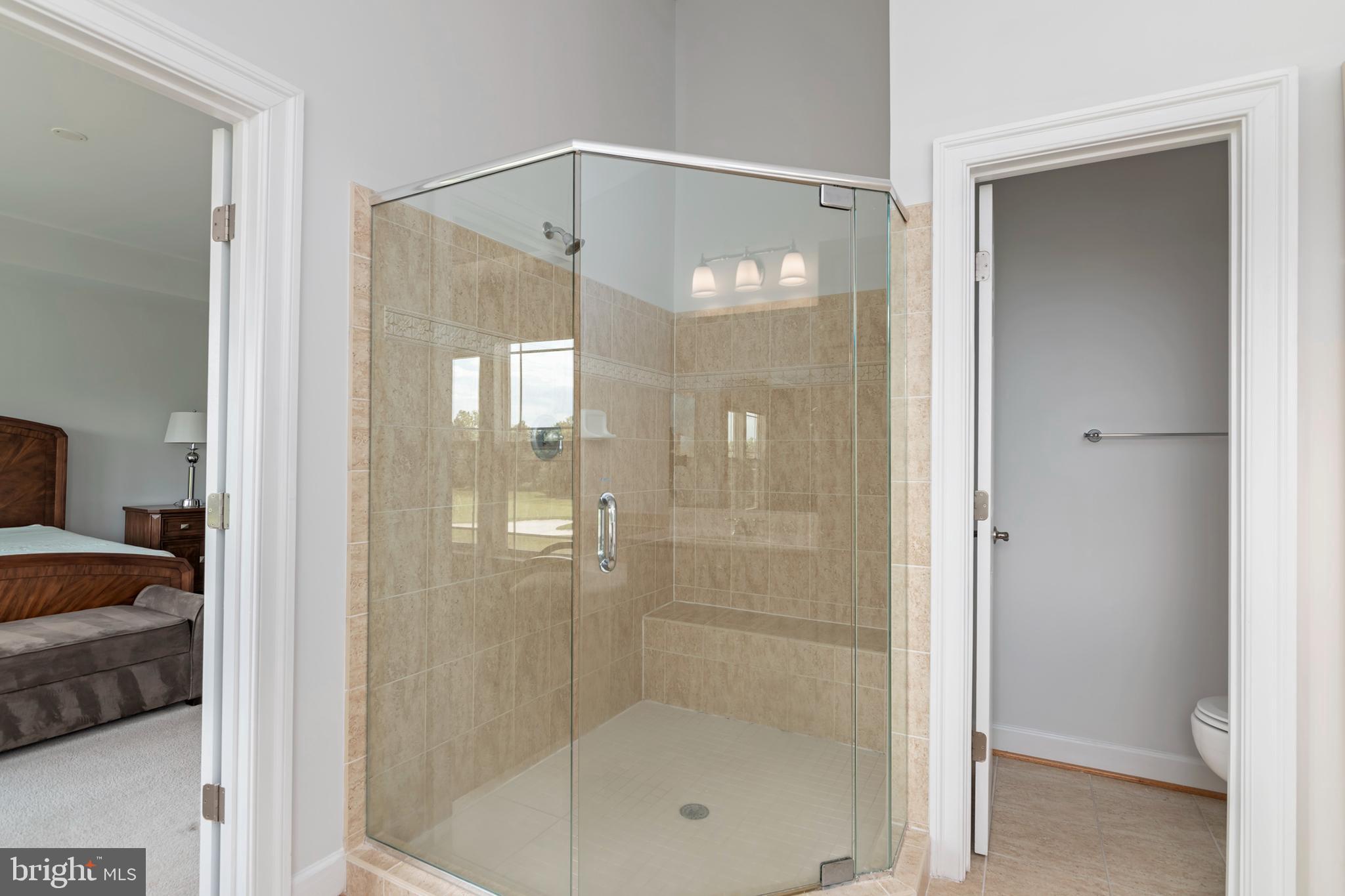 2804 Persimmon Place, Unit D3 Cambridge, MD 21613 - Photo 33 of 49 a bathroom that has a glass shower door