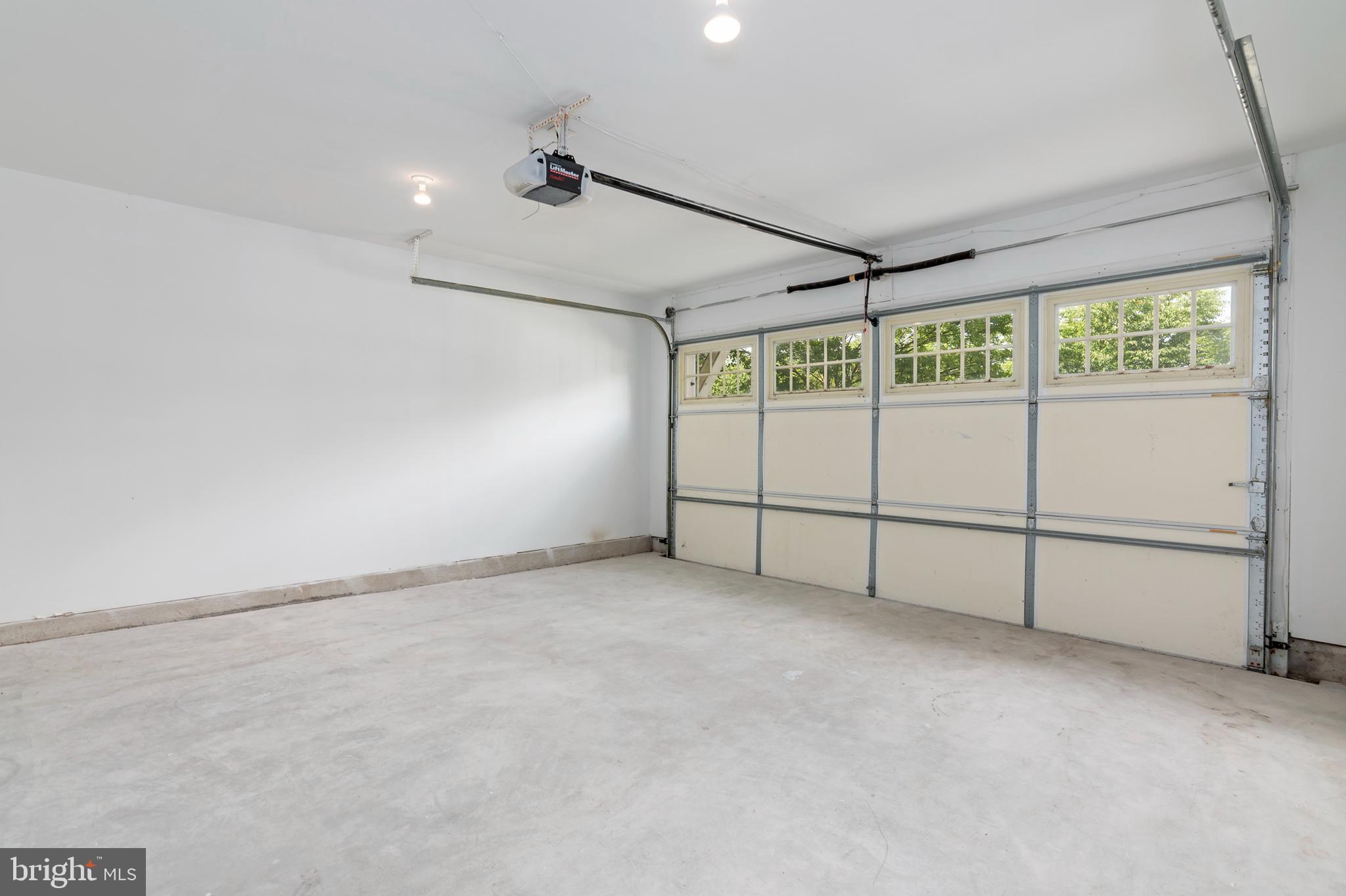 2804 Persimmon Place, Unit D3 Cambridge, MD 21613 - Photo 42 of 49 an empty room with a ceiling fan and window