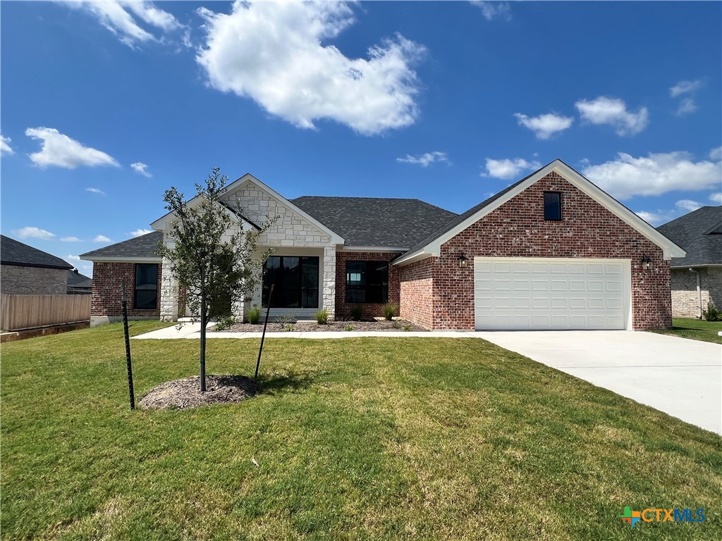 6018 Parma Lane Temple, TX 76502 - Photo 1 of 1 a front view of a house with a yard