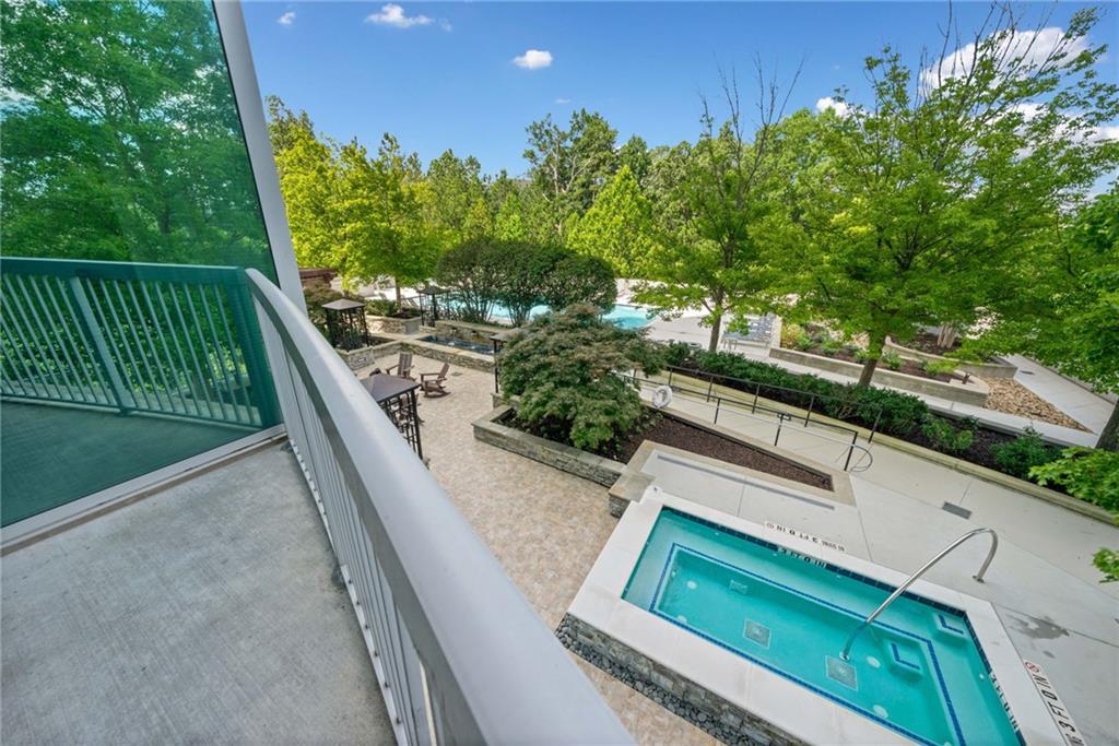 3300 Windy Ridge Parkway Southeast, Unit 621 Atlanta, GA 30339 - Photo 22 of 39 a view of a yard from a balcony
