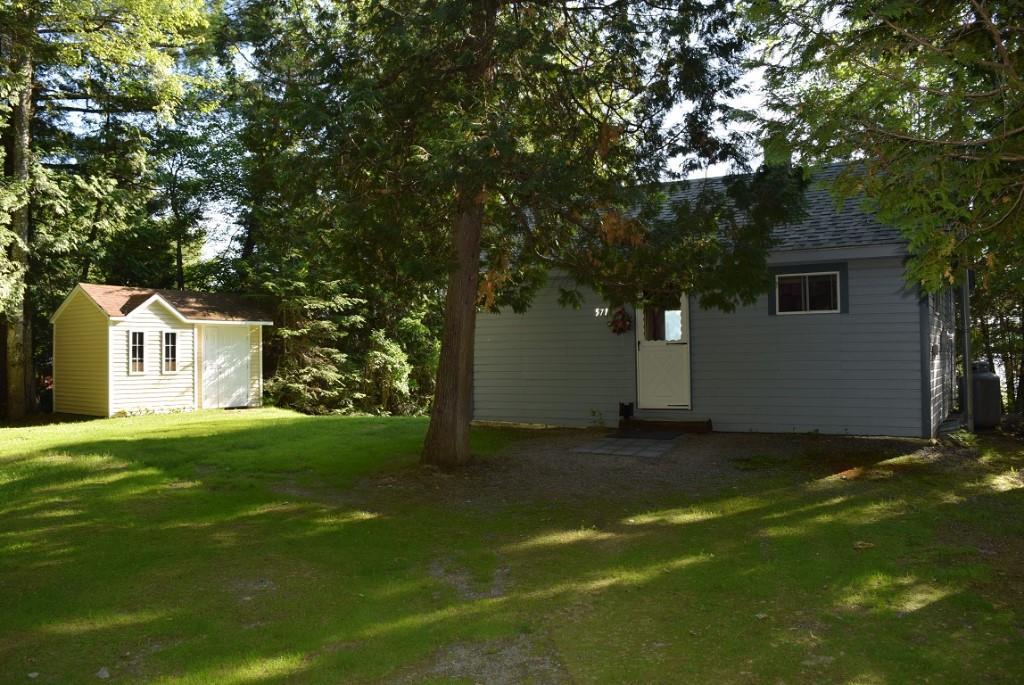 571 Phinney Farm Road Lincoln, ME 04457 - Photo 7 of 30 View of cottage and the storage...