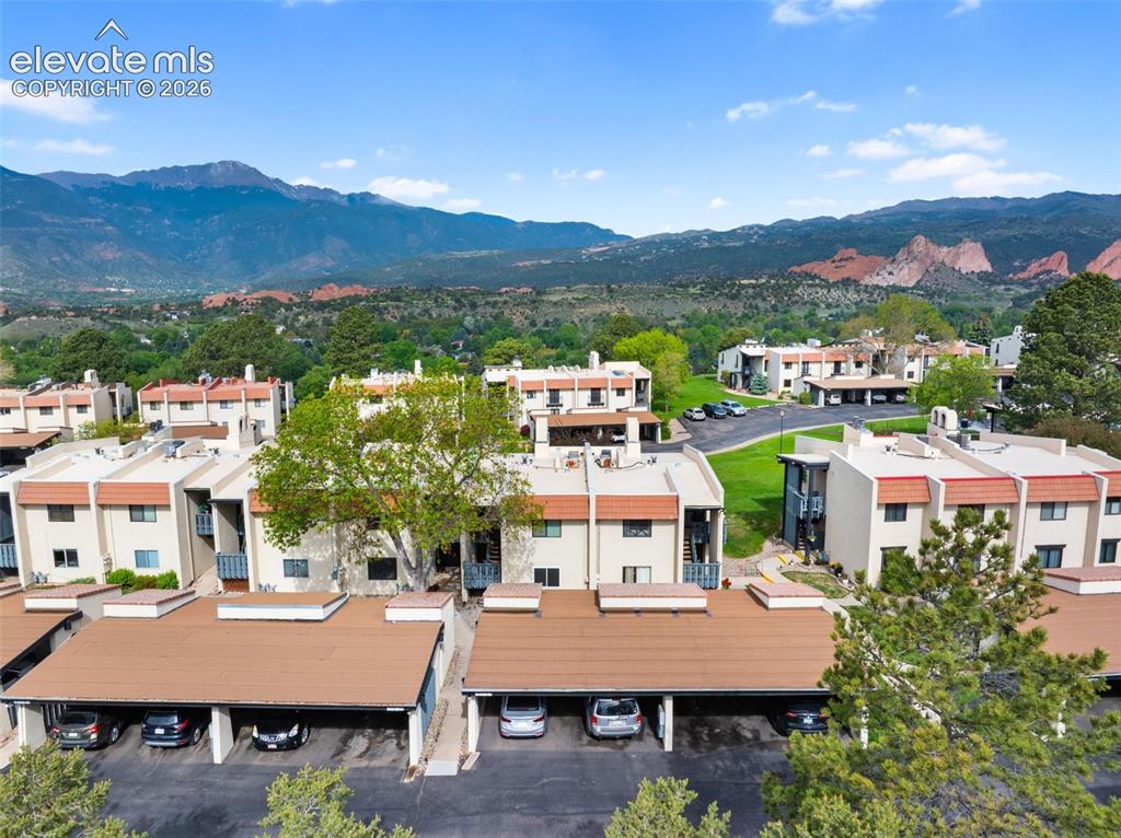 1018 Fontmore Road, Unit A Colorado Springs, CO 80904 - Photo 2 of 28 a view of a city with a mountain