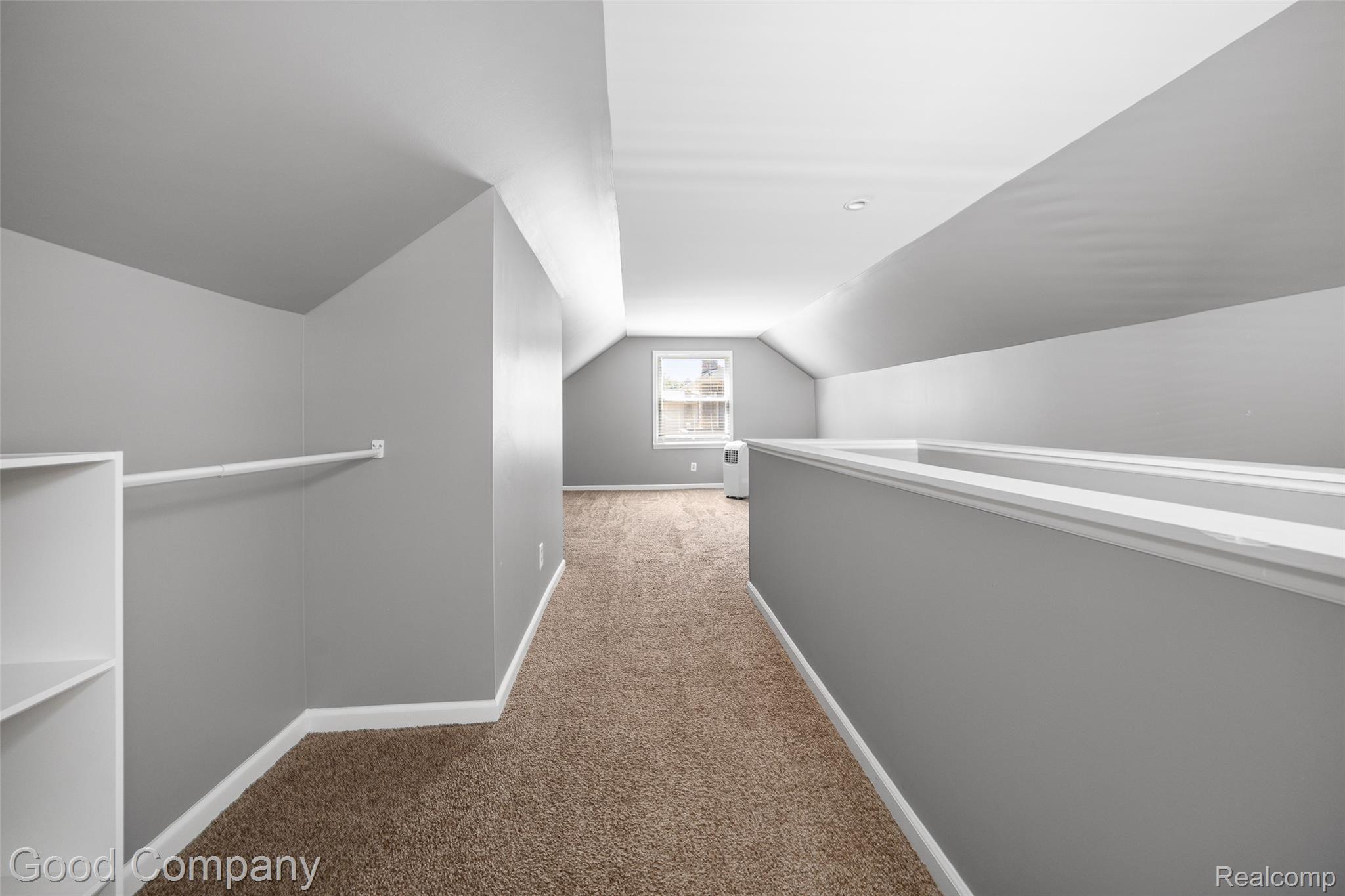 2714 South Rochester Road Royal Oak, MI 48073 - Photo 6 of 26 Corridor featuring carpet and lofted ceiling