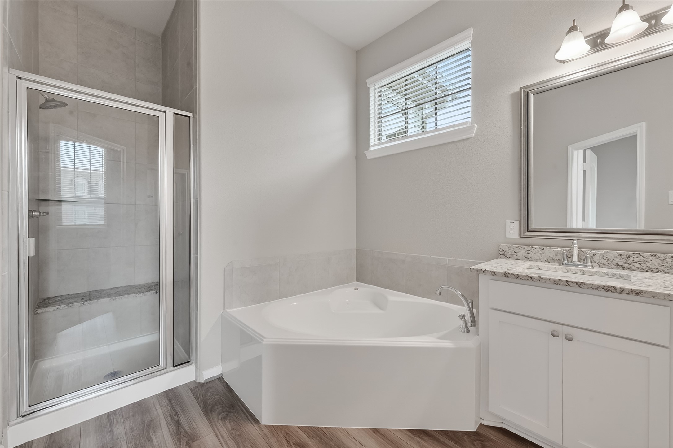 16226 Rattlesnake Run Trail Cypress, TX 77433 - Photo 22 of 37 Primary bathroom with soaking tub and separate shower
