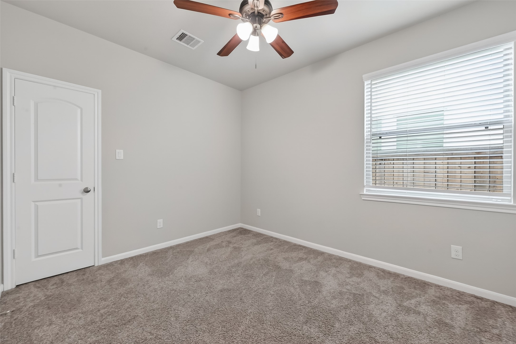 16226 Rattlesnake Run Trail Cypress, TX 77433 - Photo 25 of 37 Secondary bedroom with window and closet