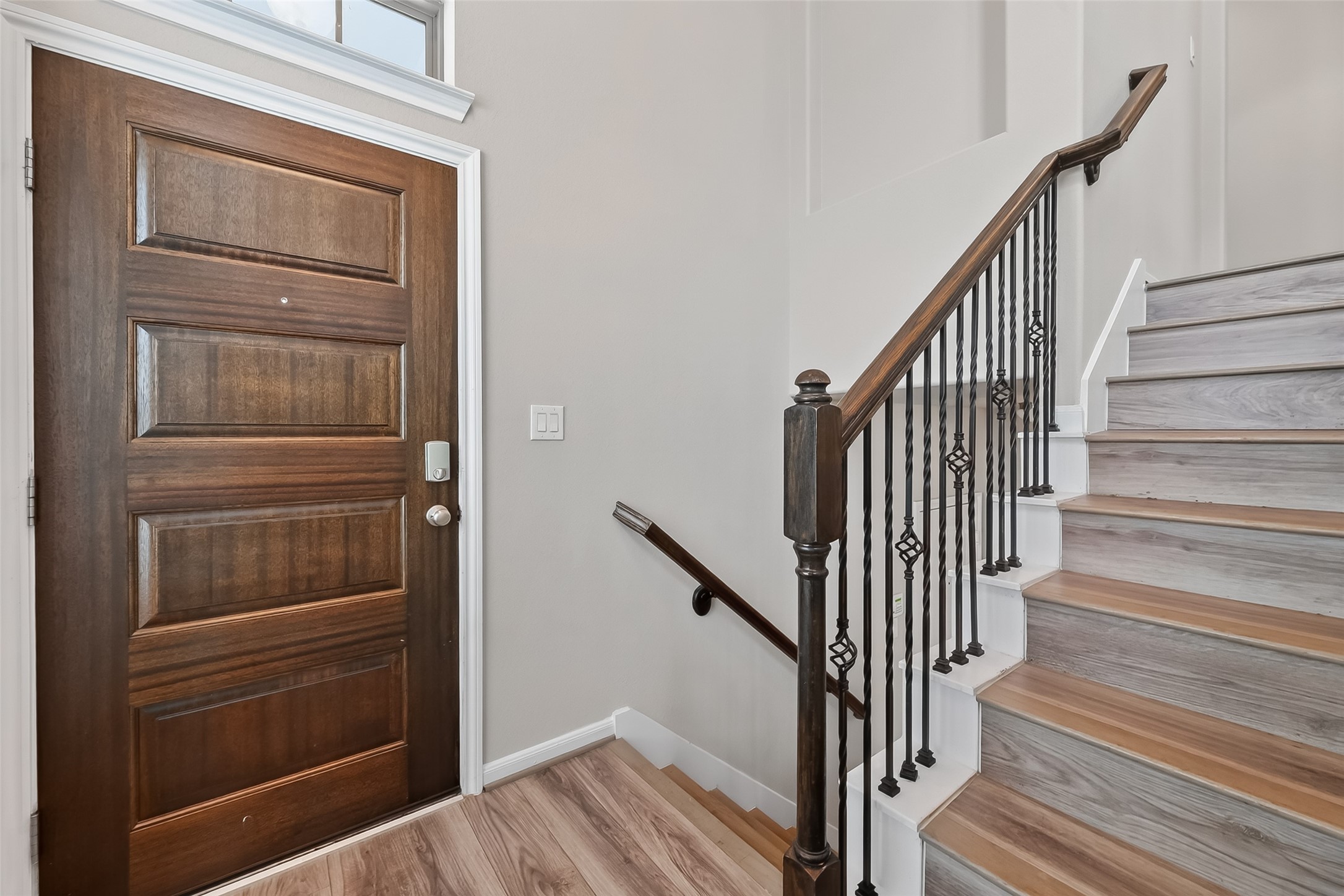 16226 Rattlesnake Run Trail Cypress, TX 77433 - Photo 6 of 37 Entry with access to stairs and main level