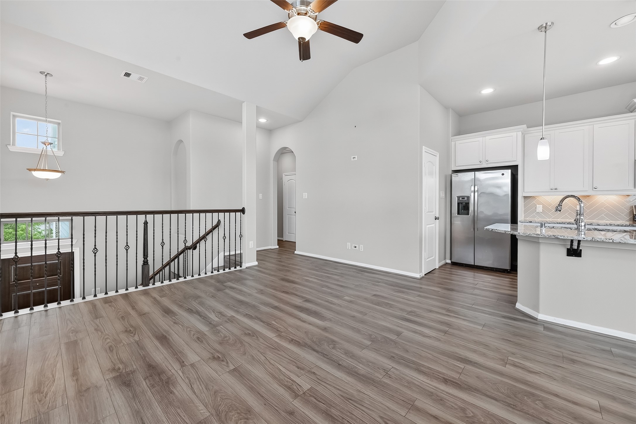 16226 Rattlesnake Run Trail Cypress, TX 77433 - Photo 8 of 37 Staircase overlooking main living space