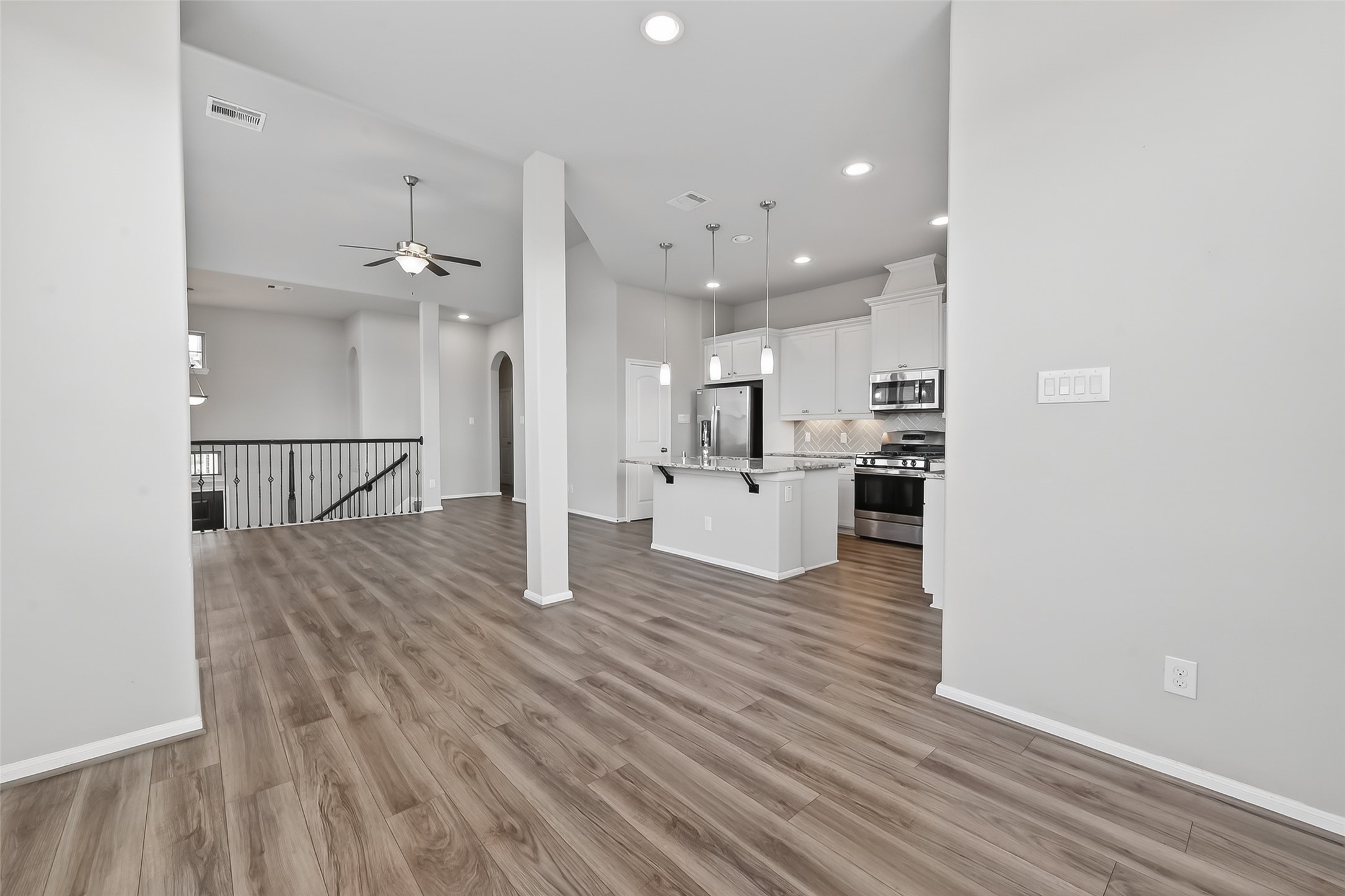 16226 Rattlesnake Run Trail Cypress, TX 77433 - Photo 10 of 37 Alternate view of living room showing open layout