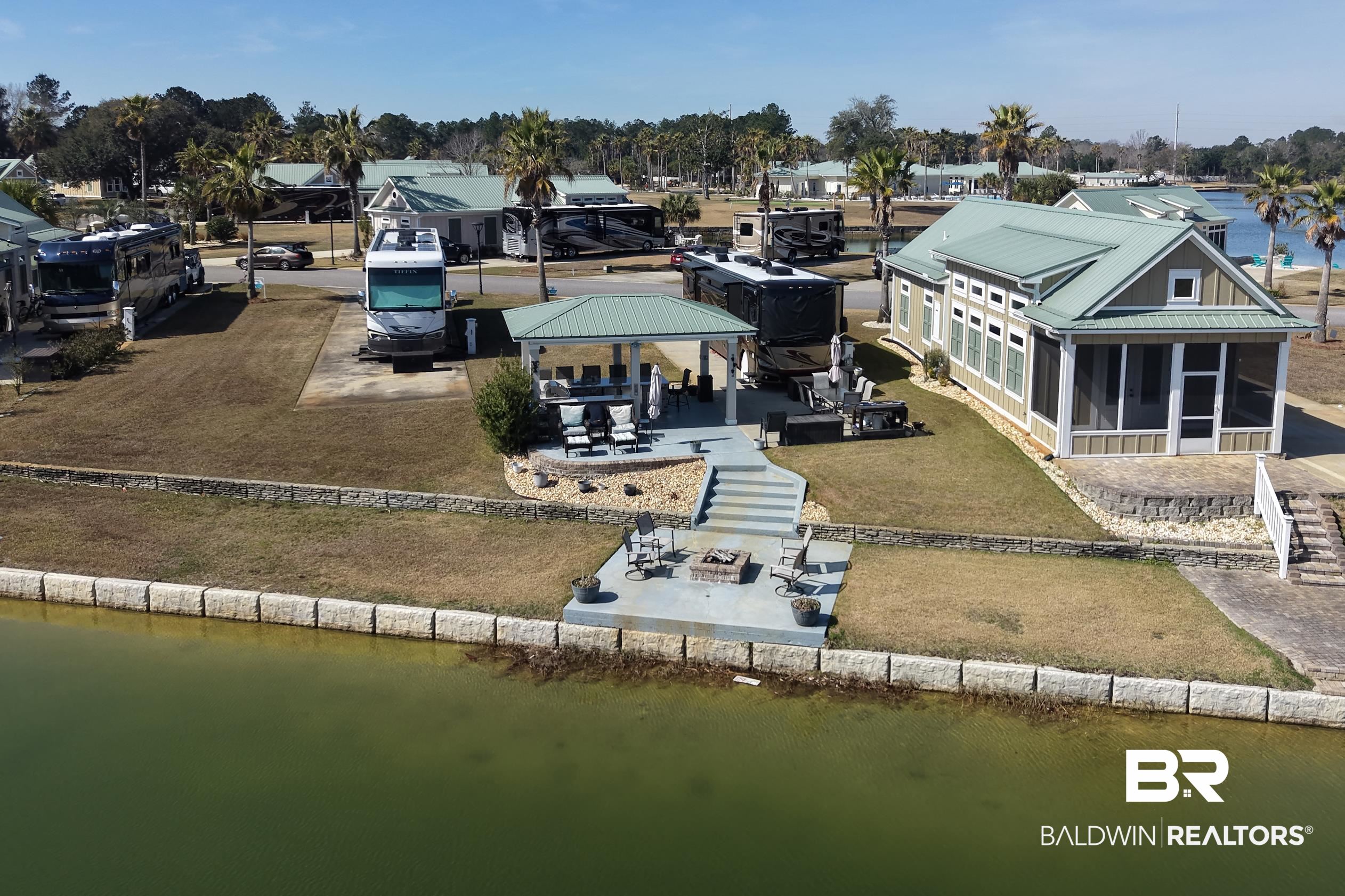 11996 Raptor Court Elberta, AL 36530 - Photo 20 of 45 Drone / aerial view of a large body of water