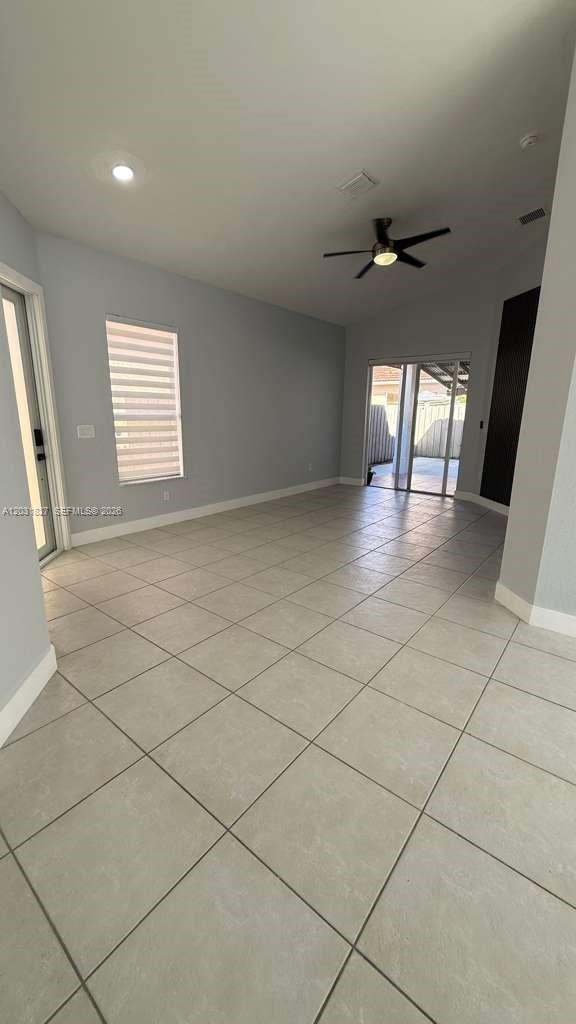 2120 Northeast 37th Road, Unit 1 Homestead, FL 33033 - Photo 15 of 30 a view of an empty room with a window