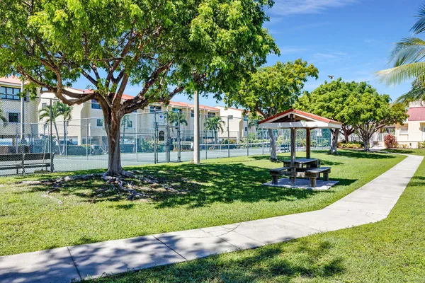 a view of a backyard of a house