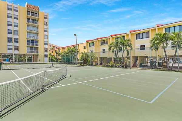 a view of street with tall buildings