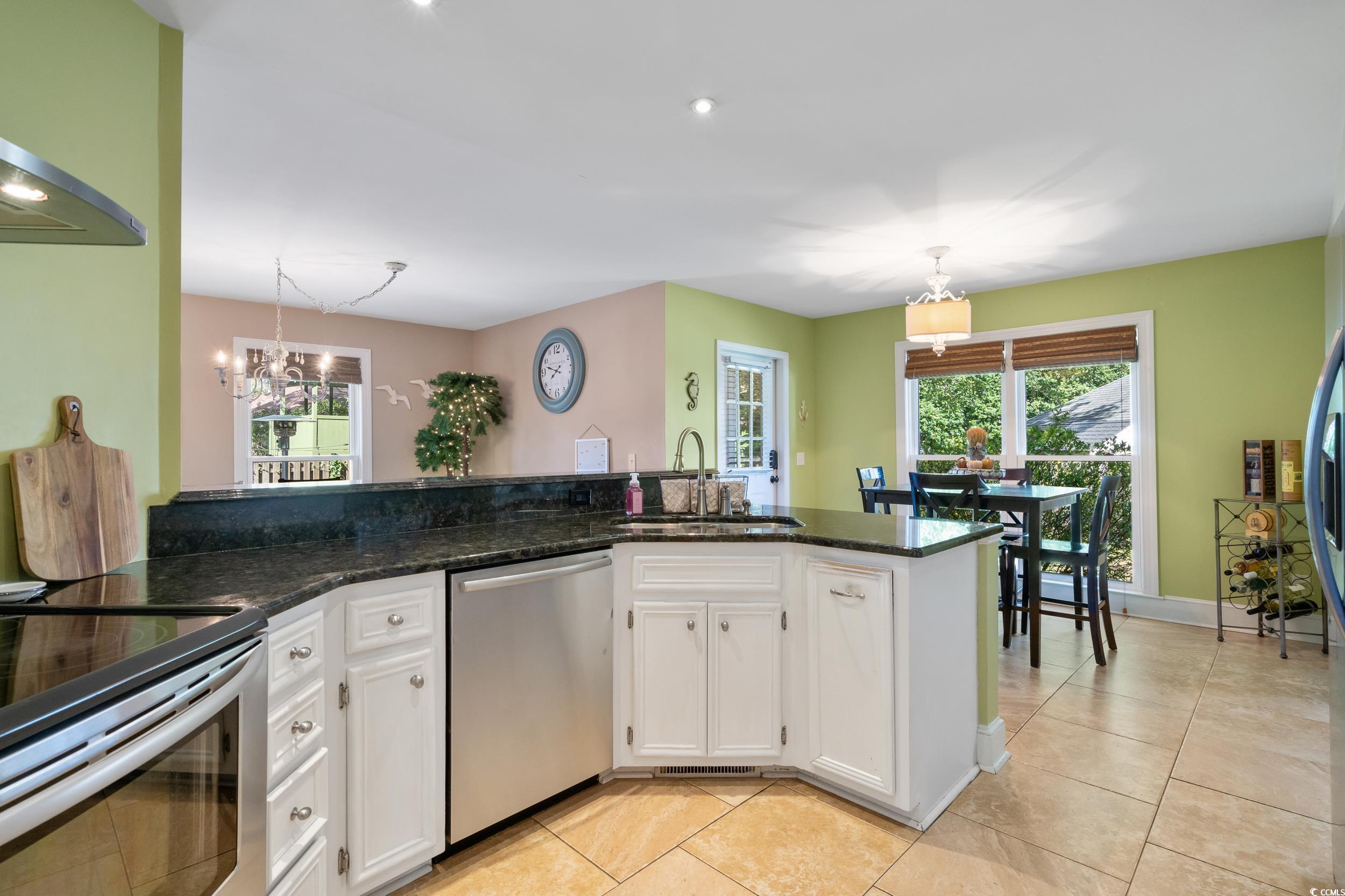 824 Mount Gilead Pl Drive Murrells Inlet, SC 29576 - Photo 15 of 40 Kitchen featuring a wealth of natural light, hangi