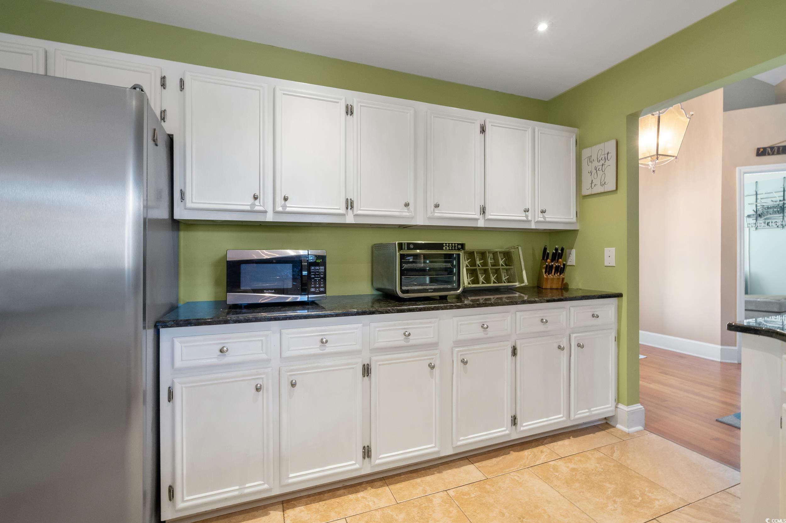 824 Mount Gilead Pl Drive Murrells Inlet, SC 29576 - Photo 17 of 40 Kitchen with light tile patterned flooring, white