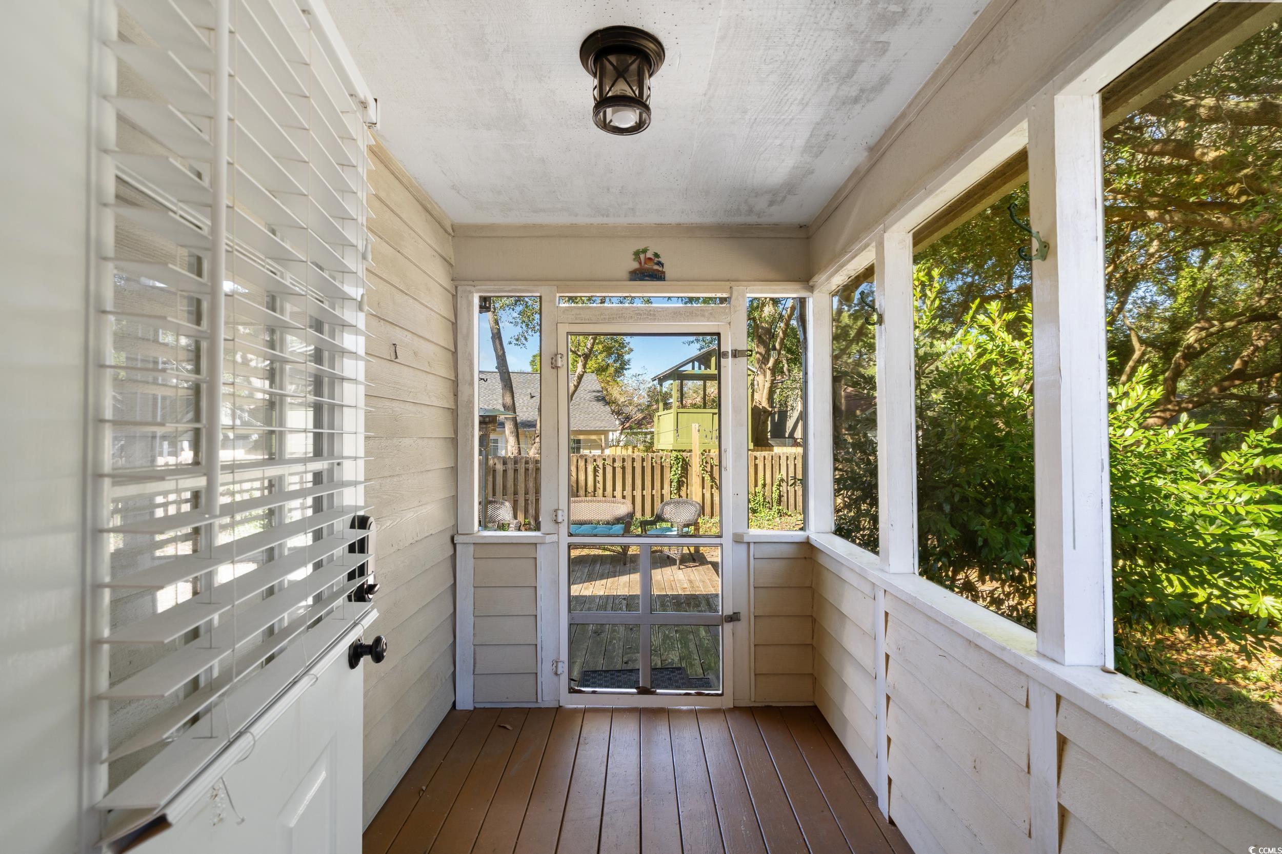 824 Mount Gilead Pl Drive Murrells Inlet, SC 29576 - Photo 22 of 40 View of unfurnished sunroom