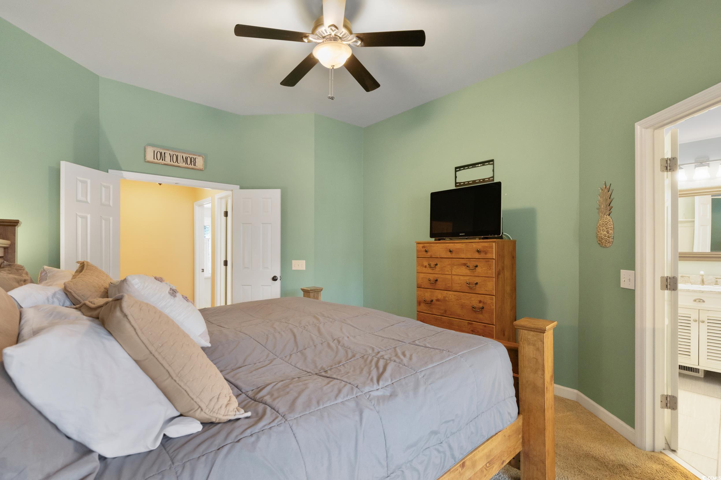 824 Mount Gilead Pl Drive Murrells Inlet, SC 29576 - Photo 23 of 40 Bedroom with ceiling fan, light colored carpet, an