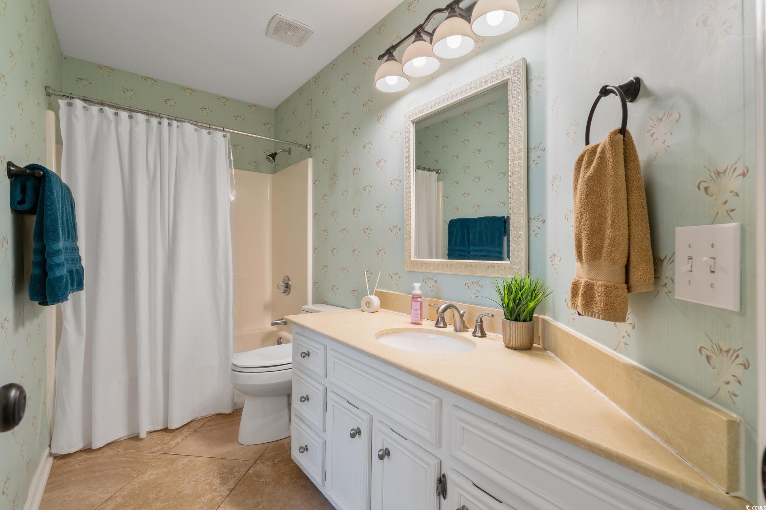 824 Mount Gilead Pl Drive Murrells Inlet, SC 29576 - Photo 31 of 40 Full bathroom with toilet, vanity, tile patterned