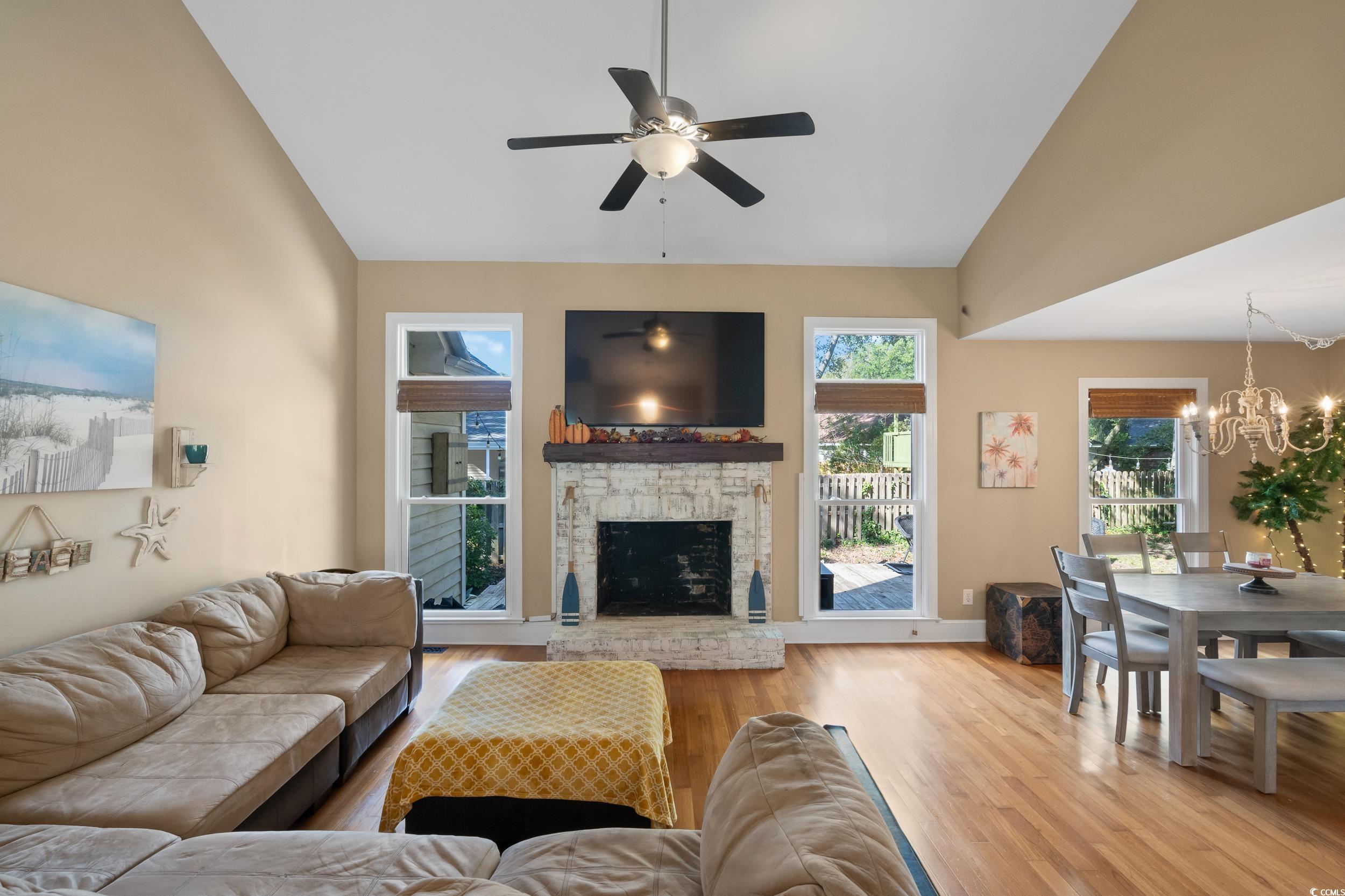 824 Mount Gilead Pl Drive Murrells Inlet, SC 29576 - Photo 4 of 40 Living room featuring a fireplace, ceiling fan wit