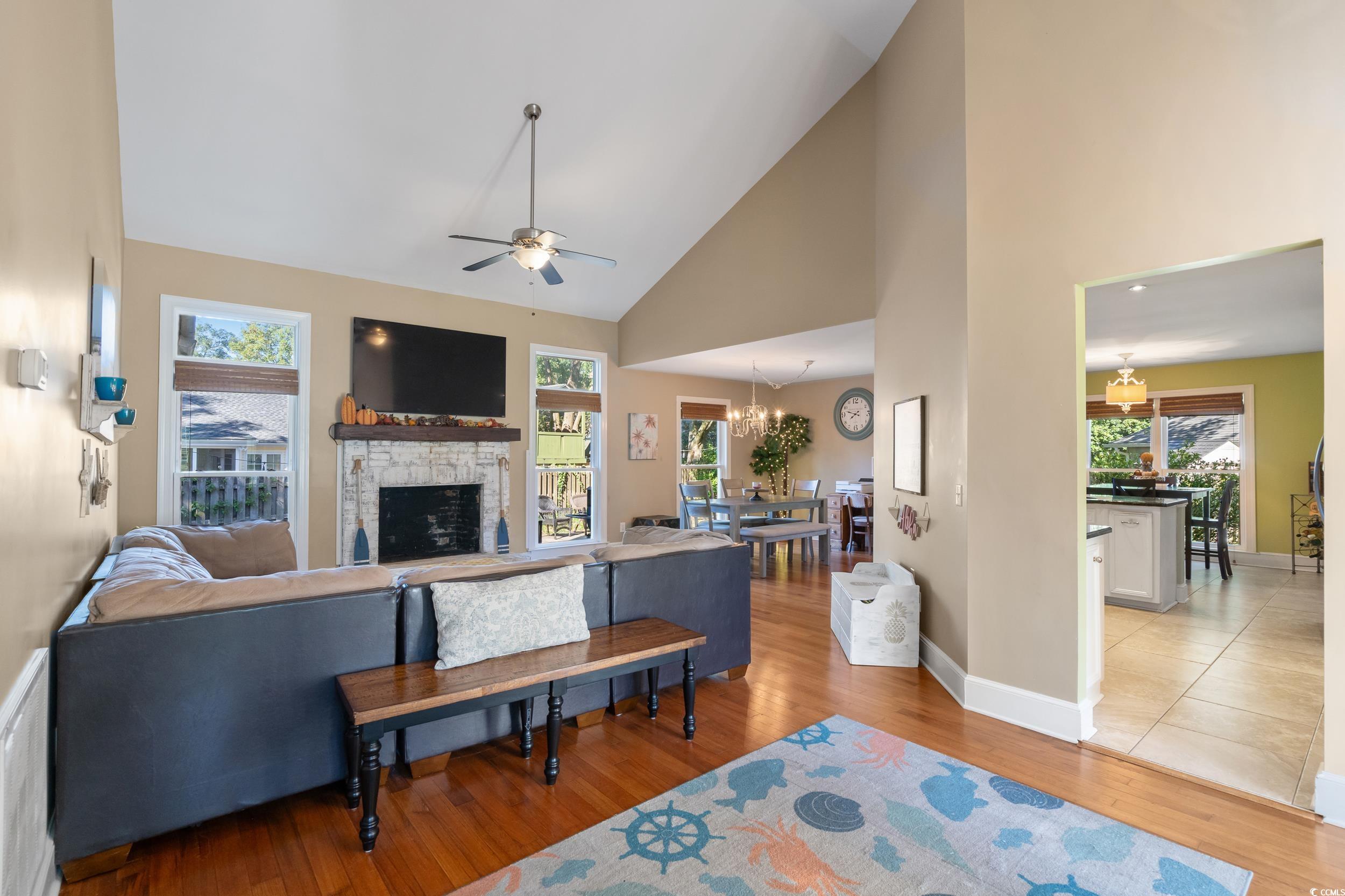 824 Mount Gilead Pl Drive Murrells Inlet, SC 29576 - Photo 8 of 40 Living room with high vaulted ceiling, ceiling fan