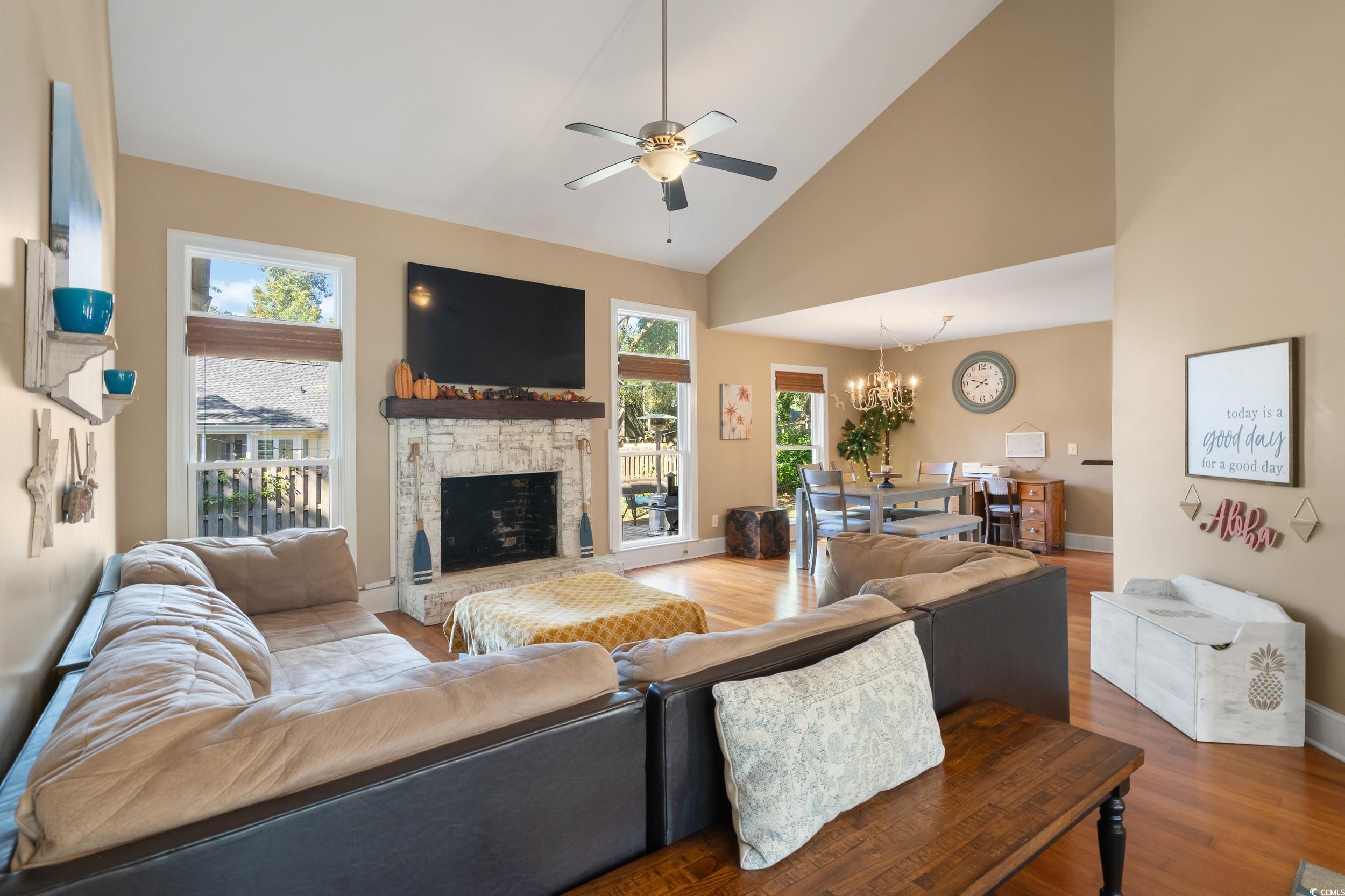 824 Mount Gilead Pl Drive Murrells Inlet, SC 29576 - Photo 9 of 40 Living room featuring a fireplace, wood-type floor
