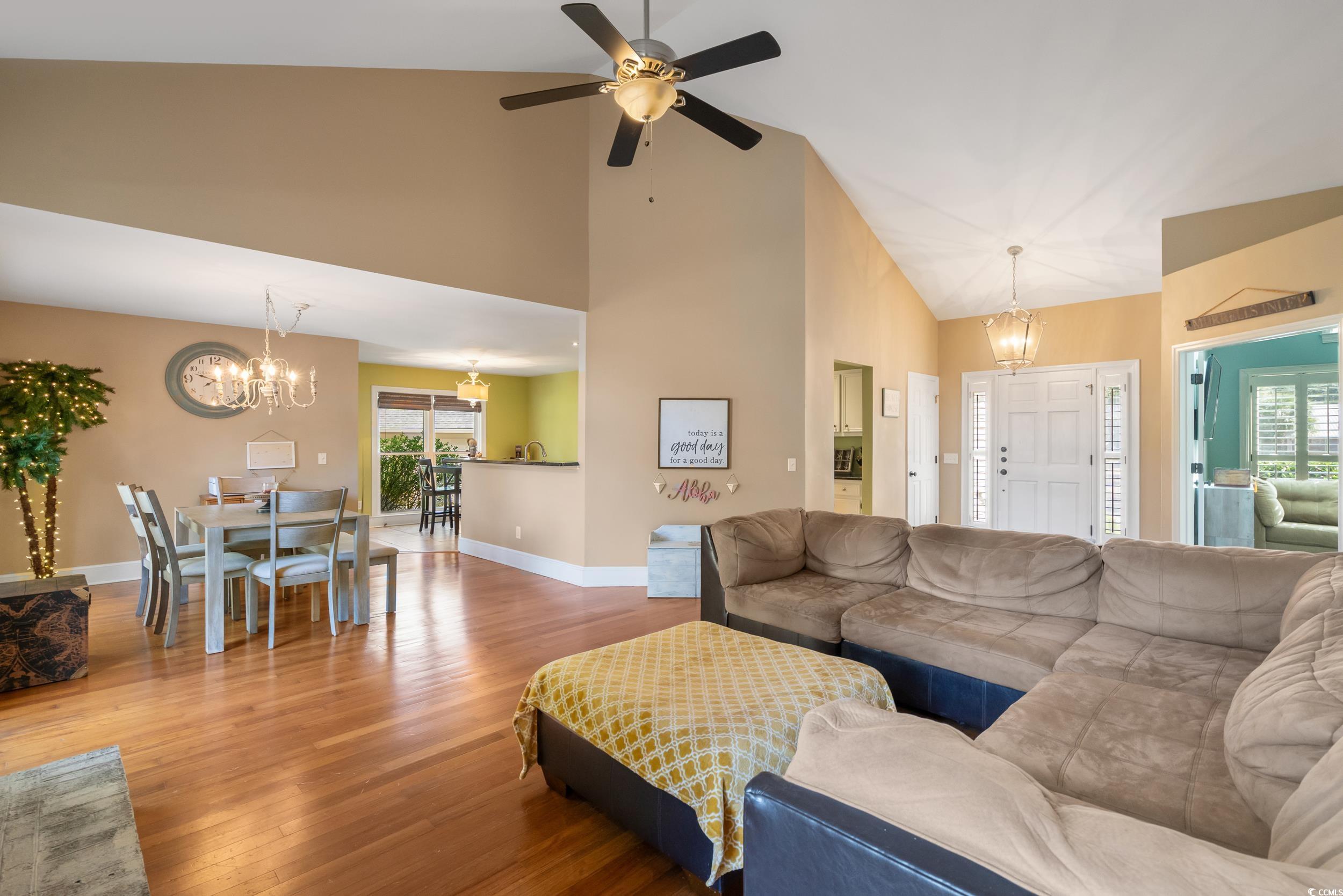824 Mount Gilead Pl Drive Murrells Inlet, SC 29576 - Photo 10 of 40 Living room with high vaulted ceiling, hardwood /