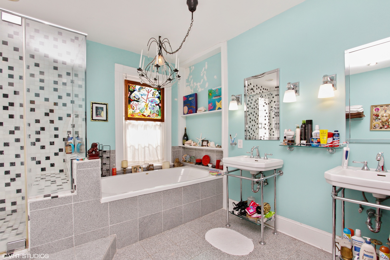 525 East 112th Street Chicago, IL 60628 - Photo 11 of 21 a bathroom with a bath tub a sink and a window