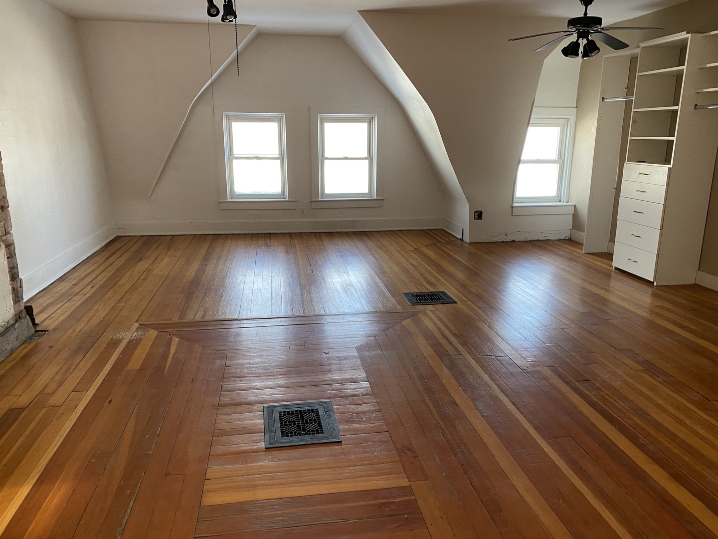 525 East 112th Street Chicago, IL 60628 - Photo 16 of 21 wooden floor in an empty room with a window