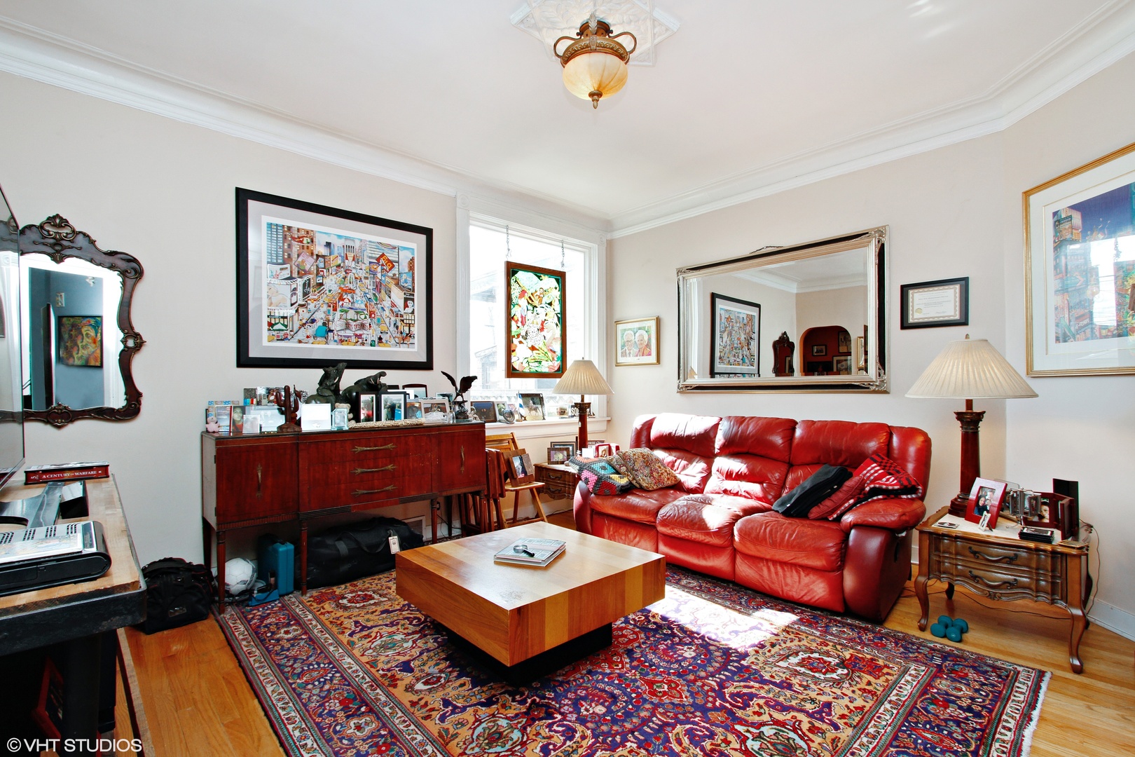 525 East 112th Street Chicago, IL 60628 - Photo 2 of 21 a living room with furniture and a flat screen tv