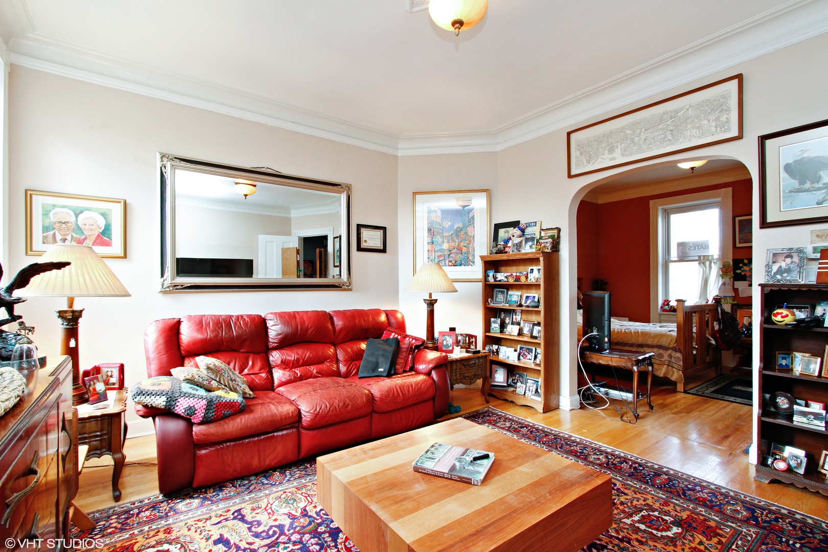 525 East 112th Street Chicago, IL 60628 - Photo 3 of 21 a living room with furniture and a flat screen tv