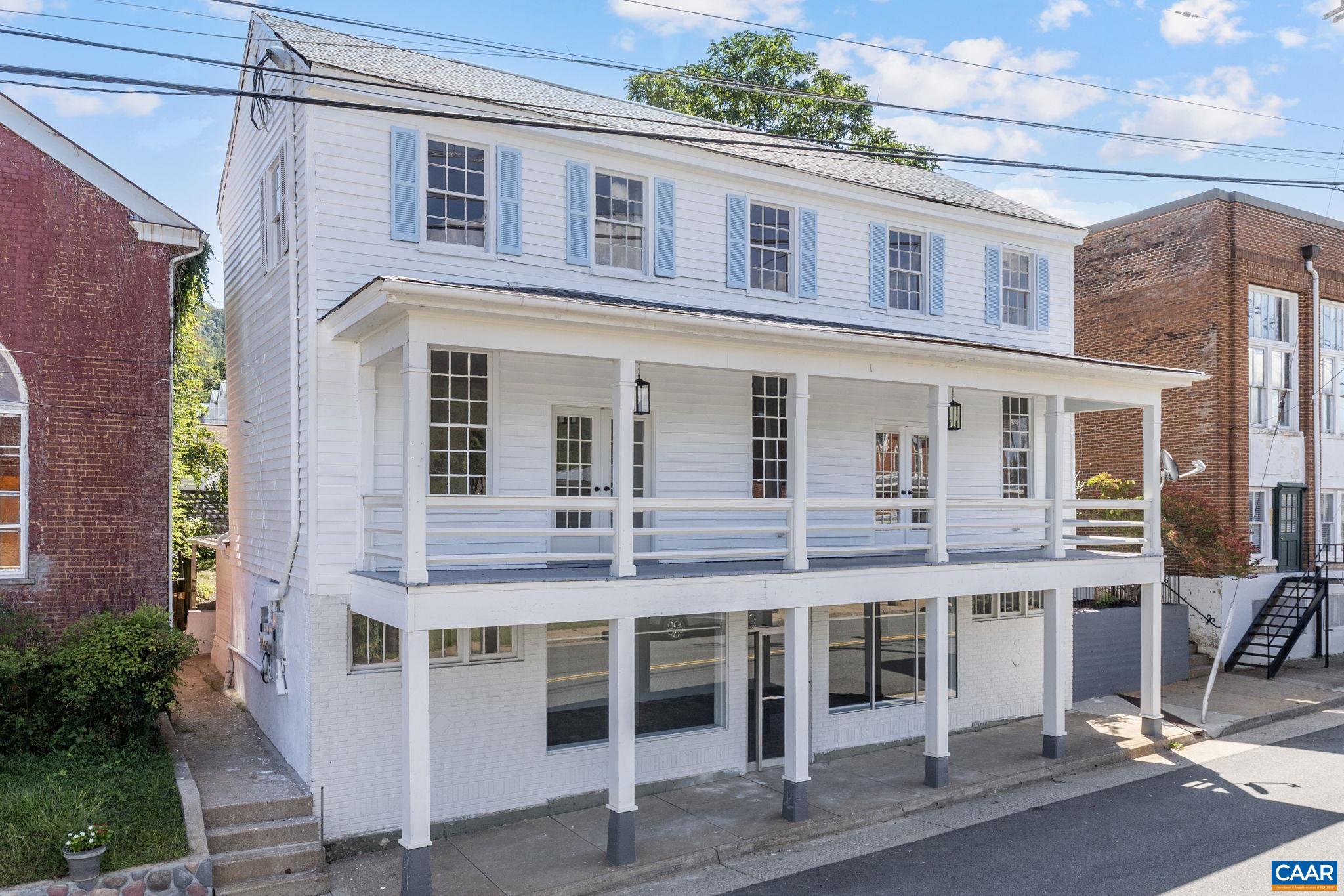 a front view of a building with glass windows