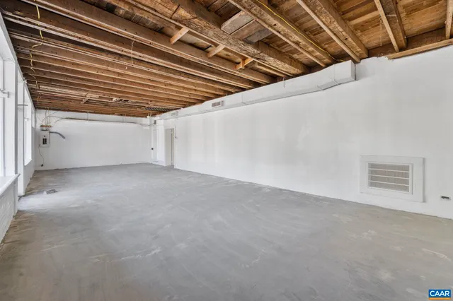 a view of a porch with a floor to ceiling window