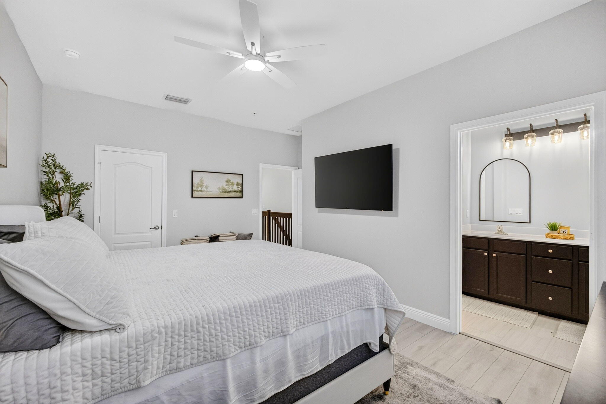 9523 Southwest Merlin Court Stuart, FL 34997 - Photo 23 of 43 PRIMARY BEDROOM