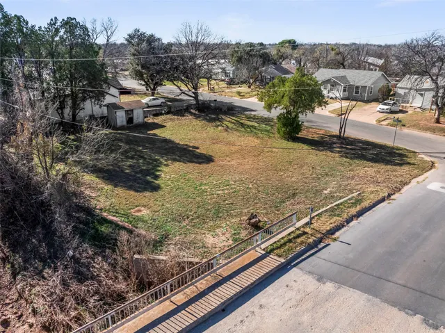 a view of a backyard of a house