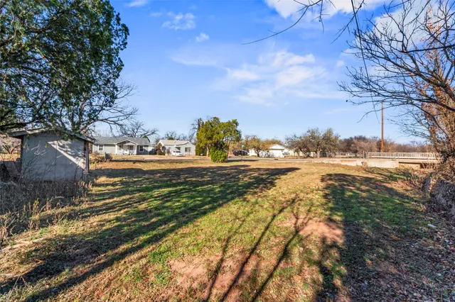 a view of an outdoor space and a yard