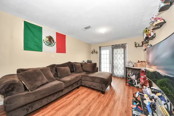 a living room with furniture and a couch
