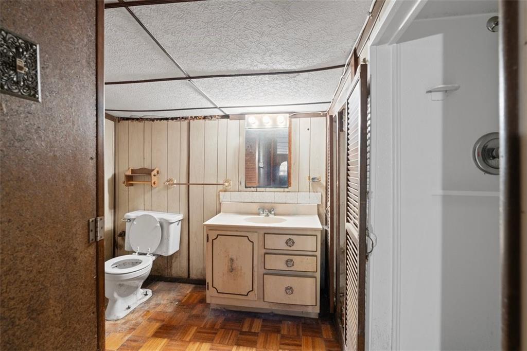 1325 Anderson Road Pittsburgh, PA 15209 - Photo 15 of 15 a bathroom with a sink toilet and shower