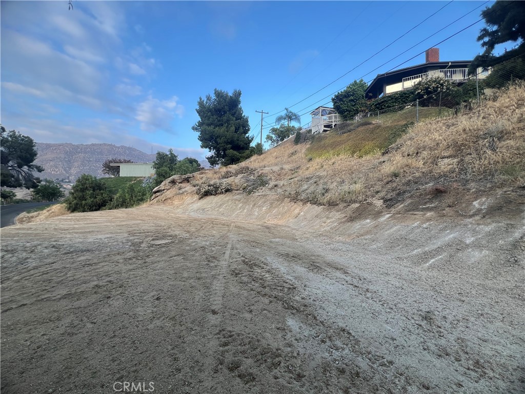 20254 West Point Drive Riverside, CA 92507 - Photo 4 of 7 a view of a dry yard with trees