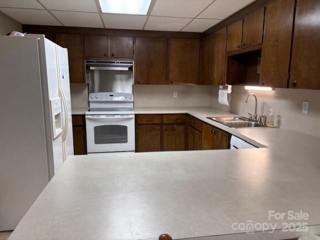 1250 21st Avenue Northeast Hickory, NC 28601 - Photo 15 of 27 a kitchen with granite countertop a refrigerator and a stove top oven