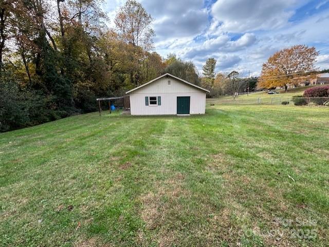 1250 21st Avenue Northeast Hickory, NC 28601 - Photo 25 of 27 a house with huge green field in front of it