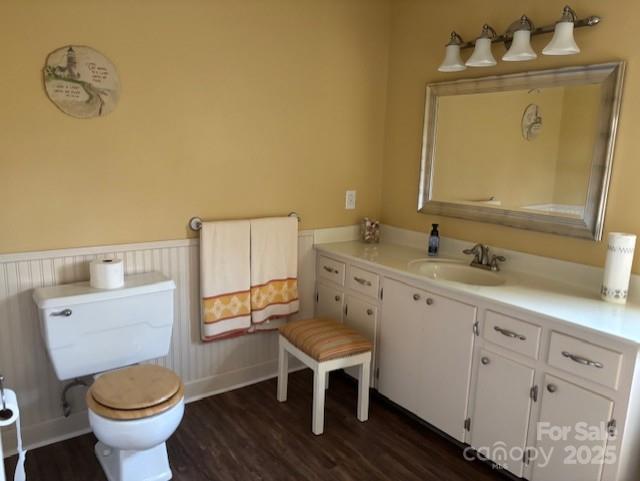 1250 21st Avenue Northeast Hickory, NC 28601 - Photo 9 of 27 a bathroom with a granite countertop toilet sink and mirror