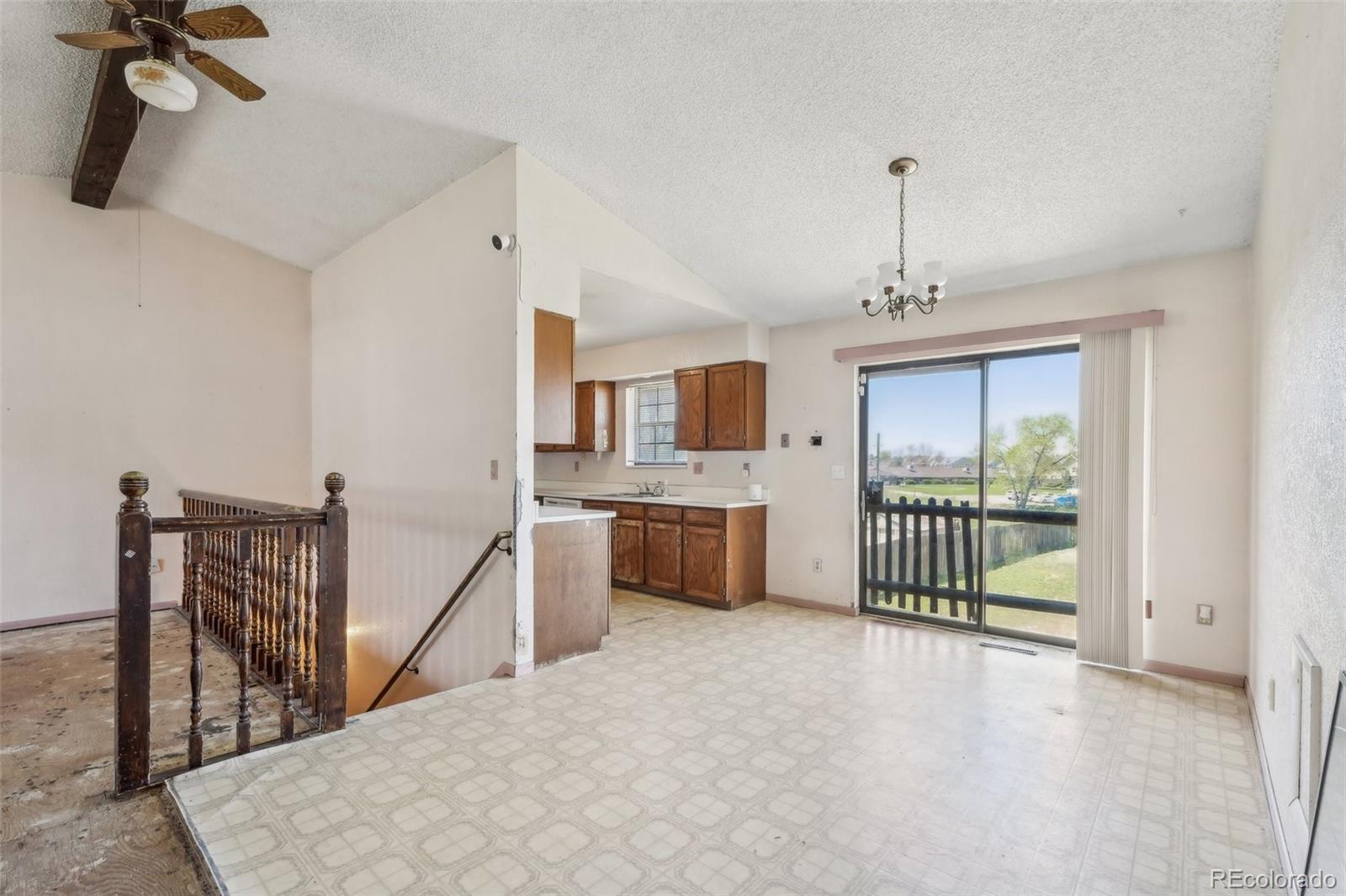 831 Sable Boulevard Aurora, CO 80011 - Photo 8 of 50 a view of a kitchen and an entryway