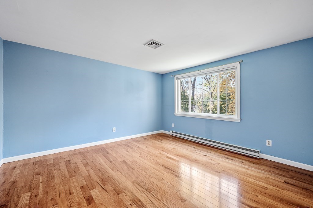 194 Paine Street Bellingham, MA 02019 - Photo 17 of 28 a view of an empty room with window