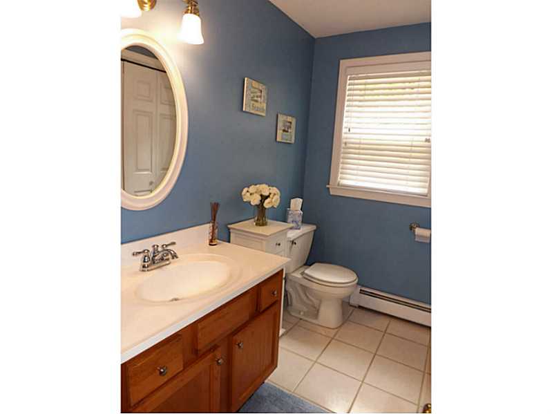 39 Old Road Charlestown, RI 02813 - Photo 8 of 23 Bathroom. Spacious first floor powder room has ceramic tile floor and large closet with laundry.