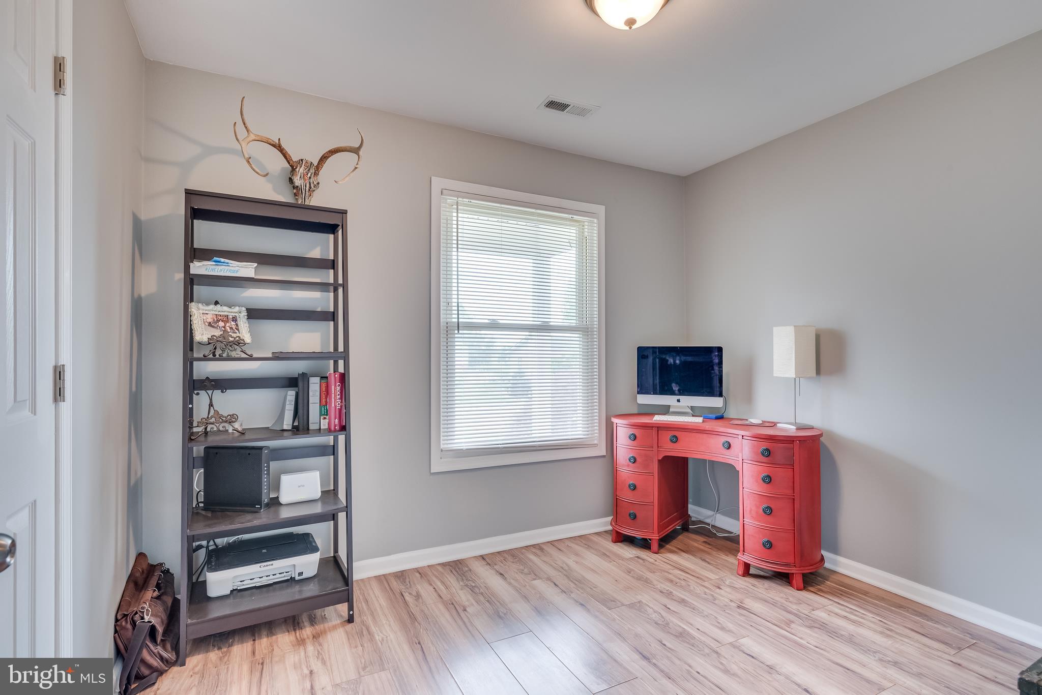 80 Hickory Lane Ranson, WV 25438 - Photo 18 of 44 Bedroom 1 features overhead light, updated floors,